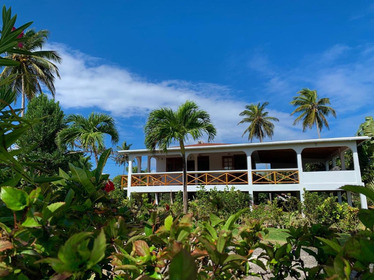 Sea Cliff Eco-Cottages & Gin Distillery Calibishie Bagian luar foto