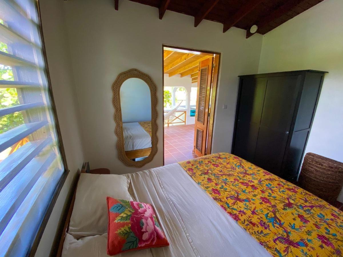 Sea Cliff Eco-Cottages & Gin Distillery Calibishie Bagian luar foto