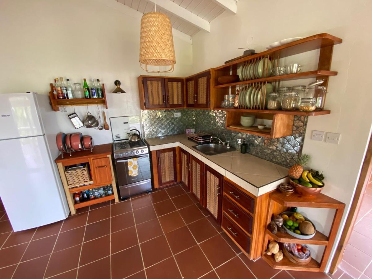Sea Cliff Eco-Cottages & Gin Distillery Calibishie Bagian luar foto