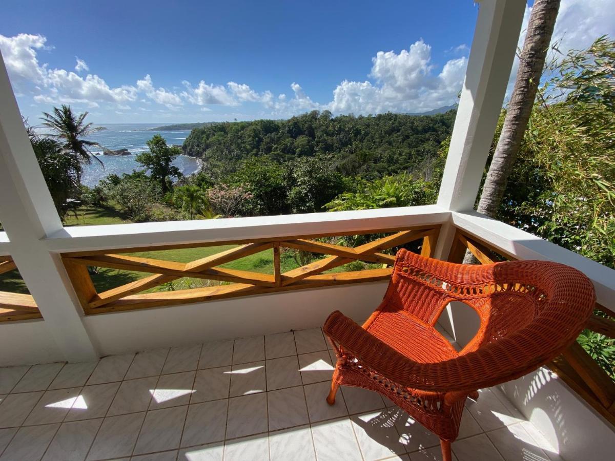 Sea Cliff Eco-Cottages & Gin Distillery Calibishie Bagian luar foto