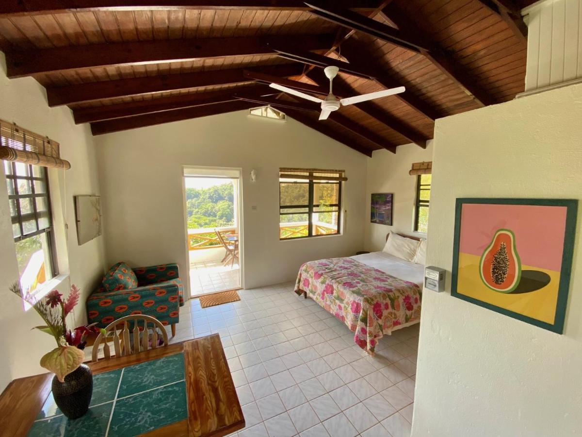 Sea Cliff Eco-Cottages & Gin Distillery Calibishie Bagian luar foto