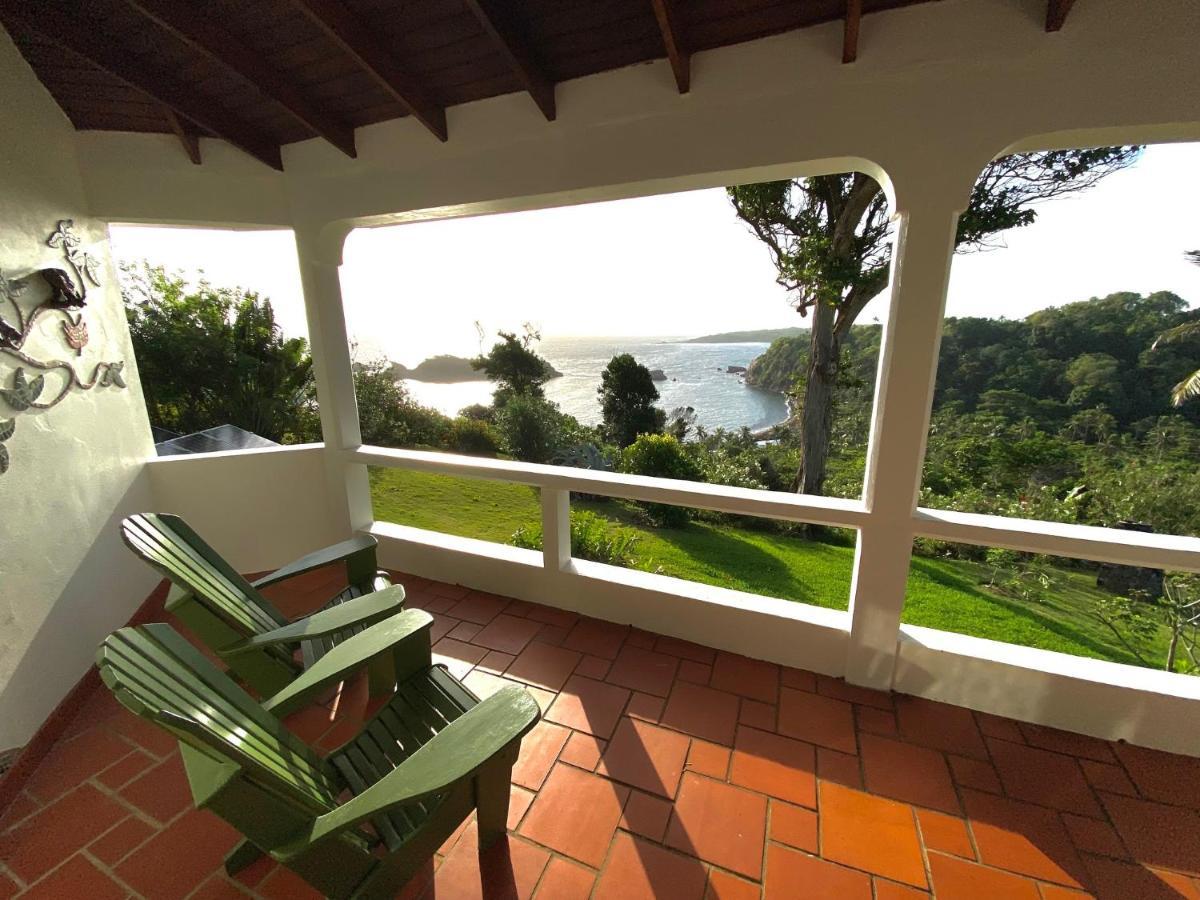 Sea Cliff Eco-Cottages & Gin Distillery Calibishie Bagian luar foto